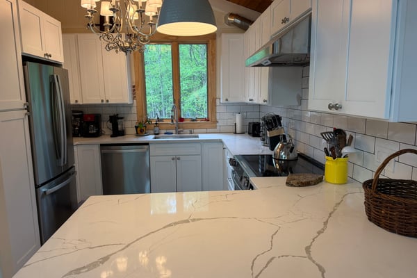 New kitchen with stainless steel appliances
